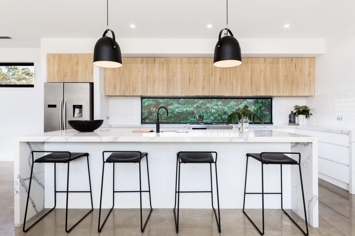 Large white luxury Australian kitchen with marble island bench