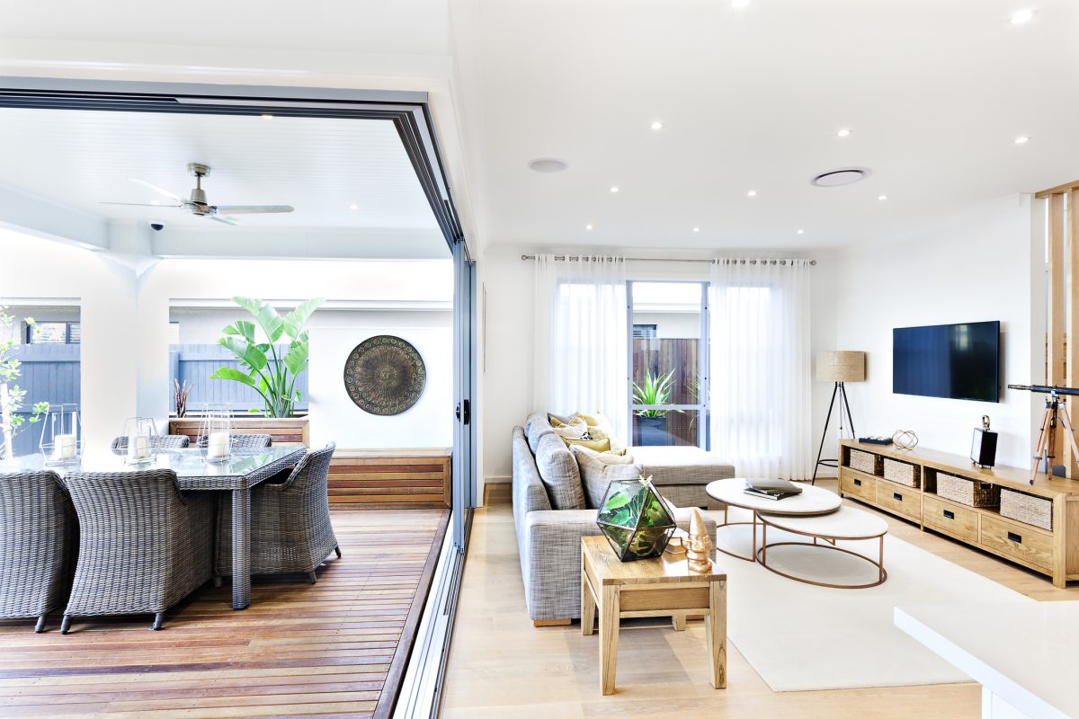 Modern style living area with a T.V. attached to the terrace with a dining table for stylish terrace dining.